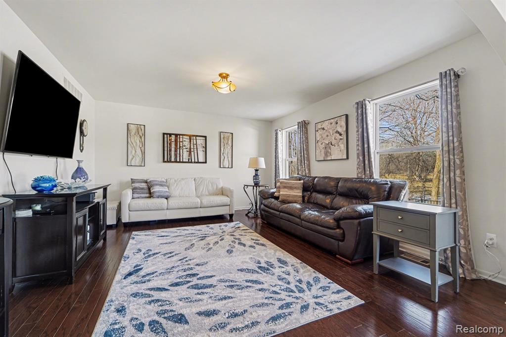 Living room with dark wood finished floors