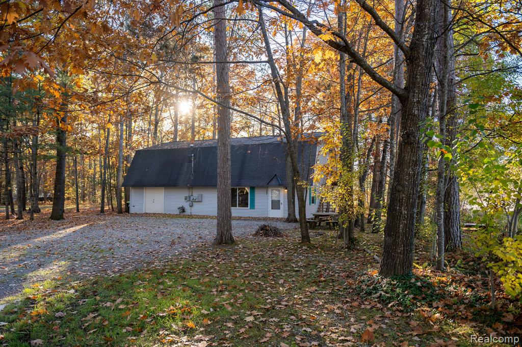 9887 W HIGGINS LAKE Drive, Roscommon, MI 48653 — front exterior