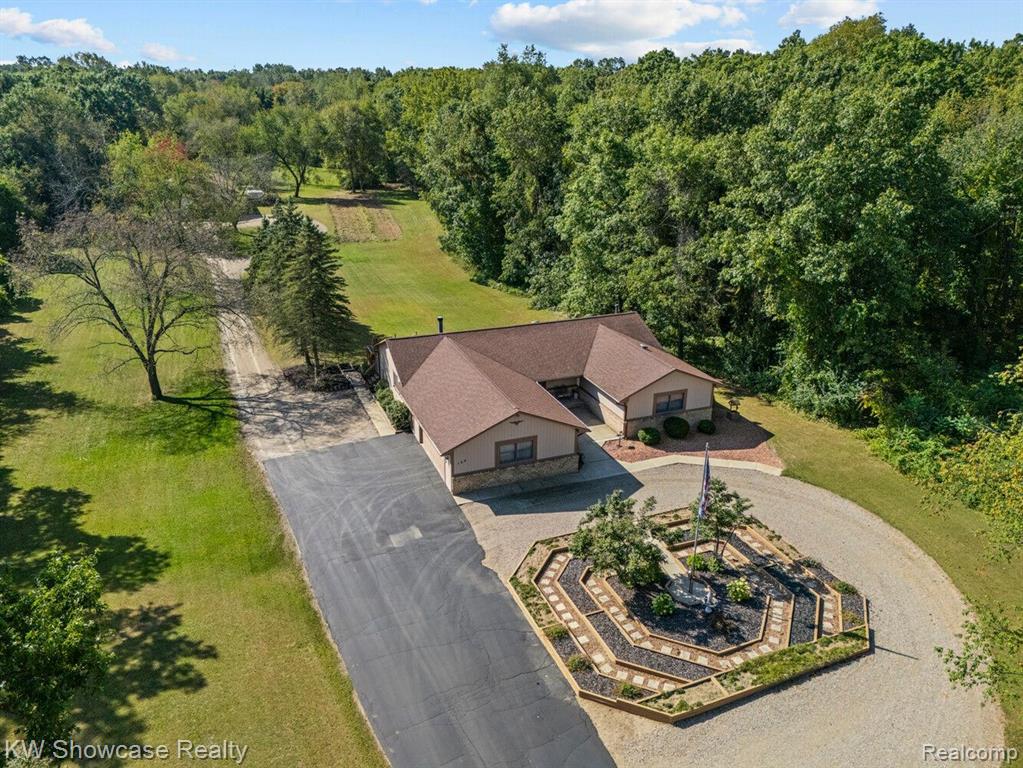 766 WHITE HOUSE Drive, Highland, MI 48356 — Photo 6
