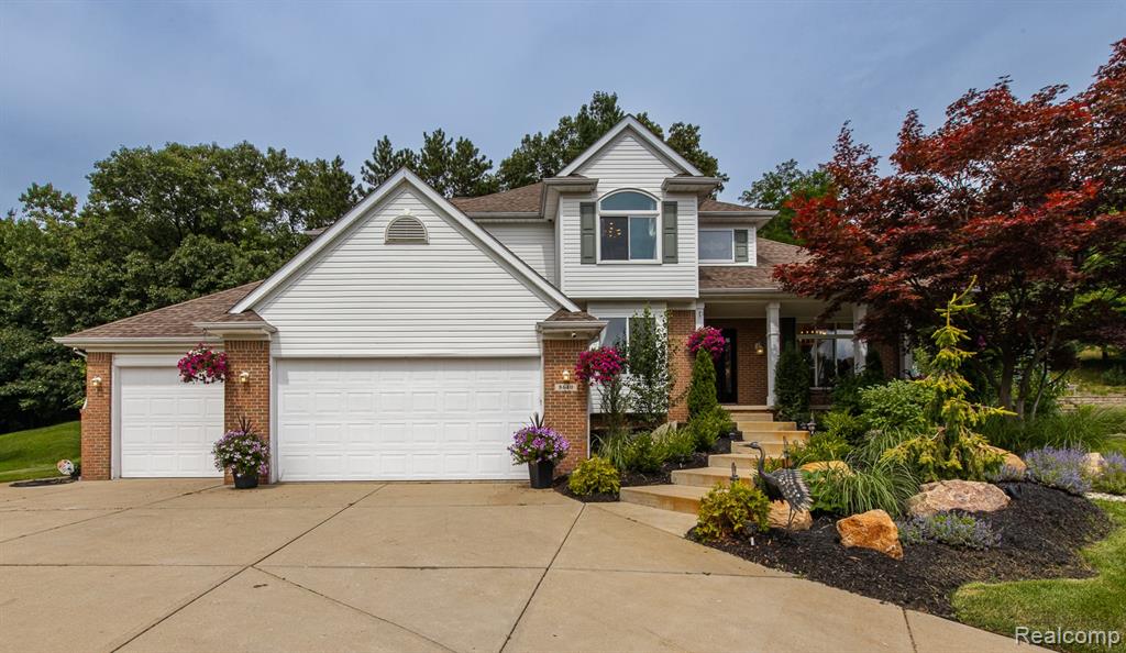 8640 Newport Drive, White Lake, MI — front exterior