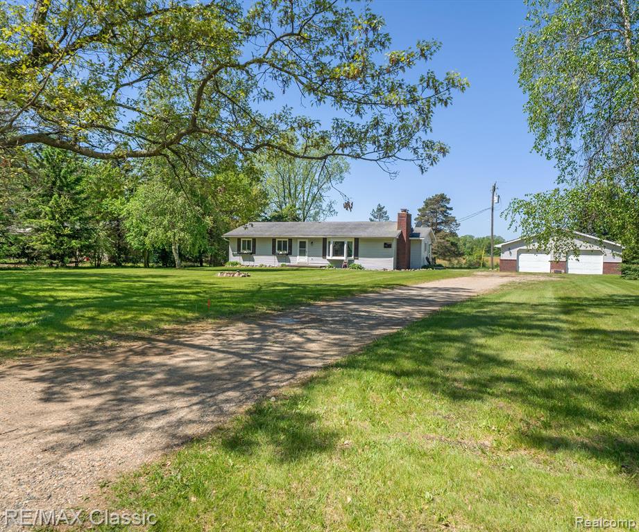 11589 OWOSSO Road, Fowlerville, MI 48836 — front exterior