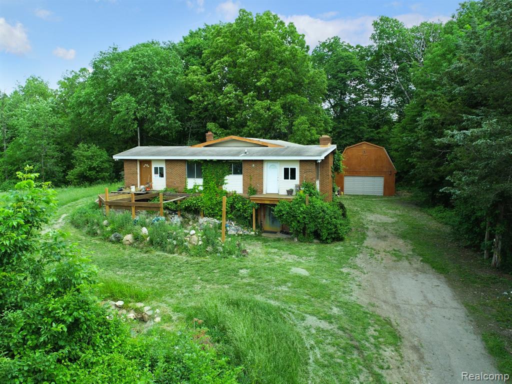 1050 Teggerdine Road, White Lake, MI — front exterior