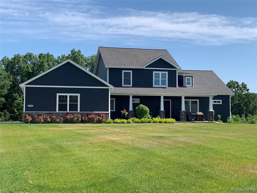 5360 Stone Garden Drive, Howell, MI 48843 — front exterior