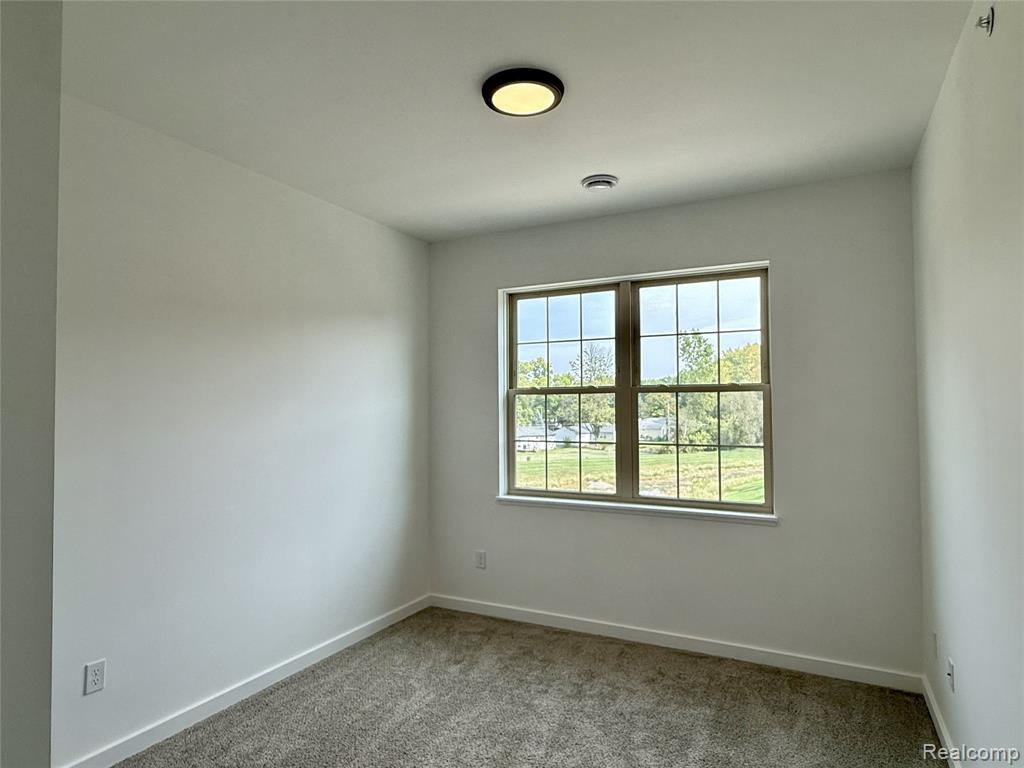 437 Village Drive, Walled Lake, MI 48390 — Photo 19
