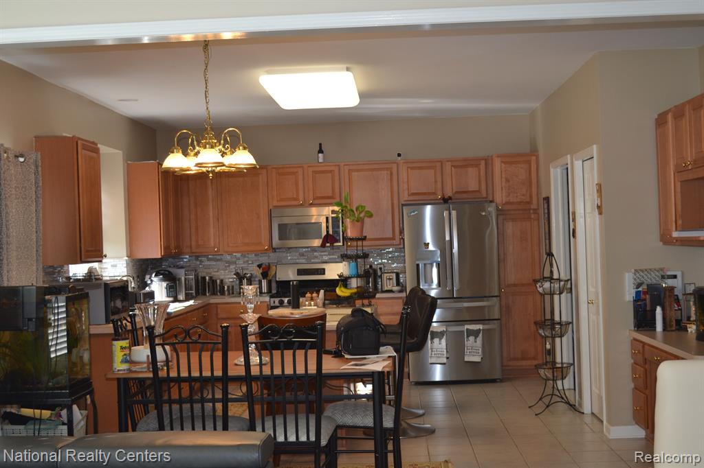 8290 HUMMINGBIRD Drive, Ypsilanti, MI 48197 — Photo 18