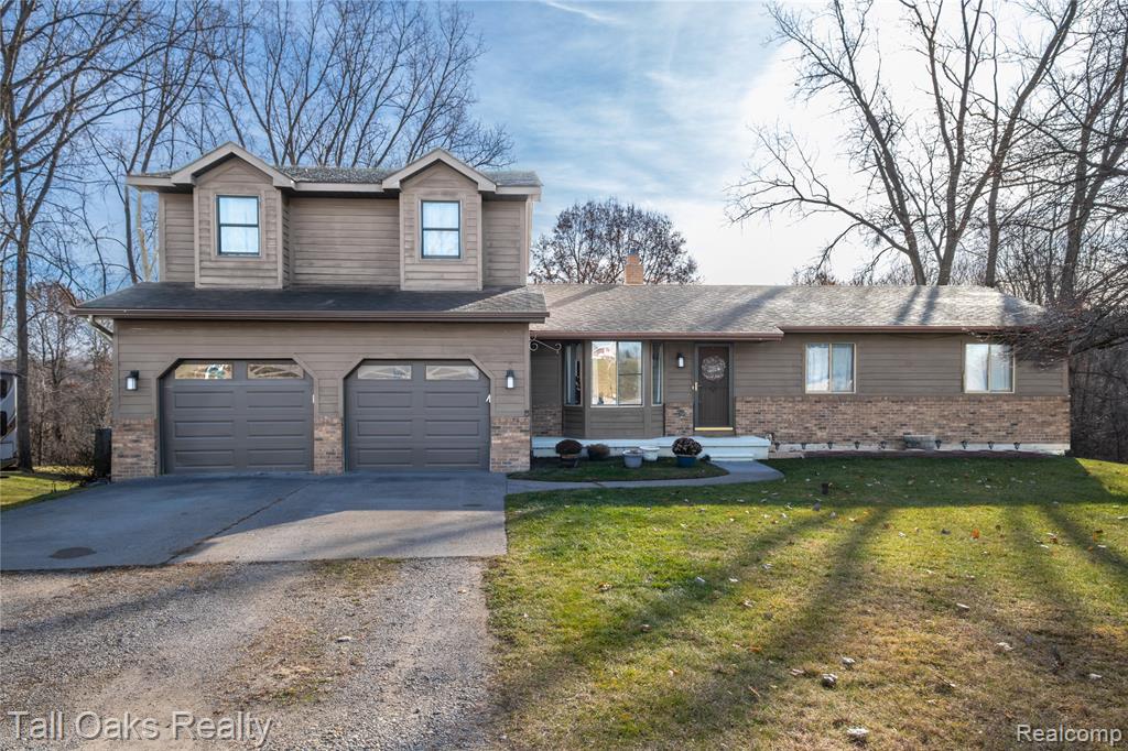 731 Cherry Hill Court, Columbiaville, MI 48421 — front exterior
