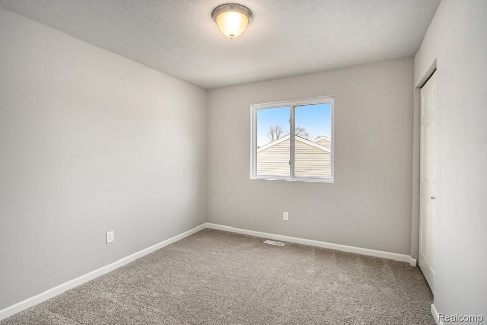731 Woodvalley Court, Corunna, MI 48817 — Photo 15