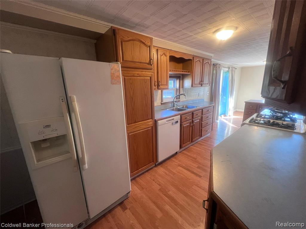 904 Rowland Road, Leonard, MI 48367 — Photo 7