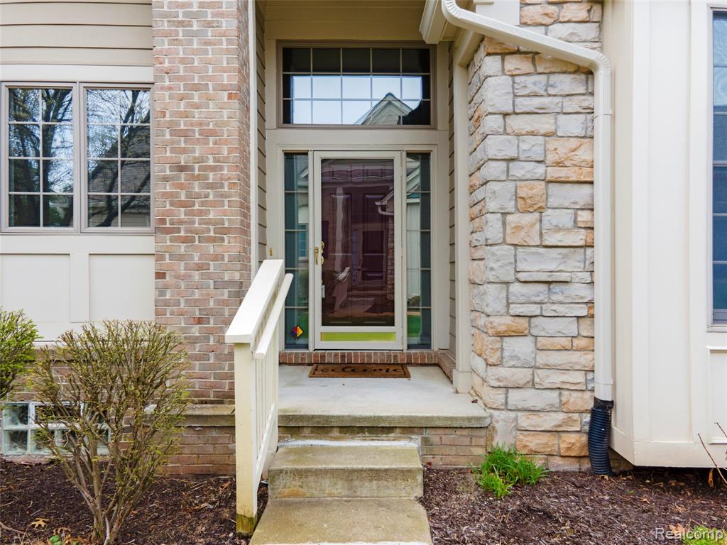 16680 Lyonhurst Circle, Northville, MI 48168 — front exterior