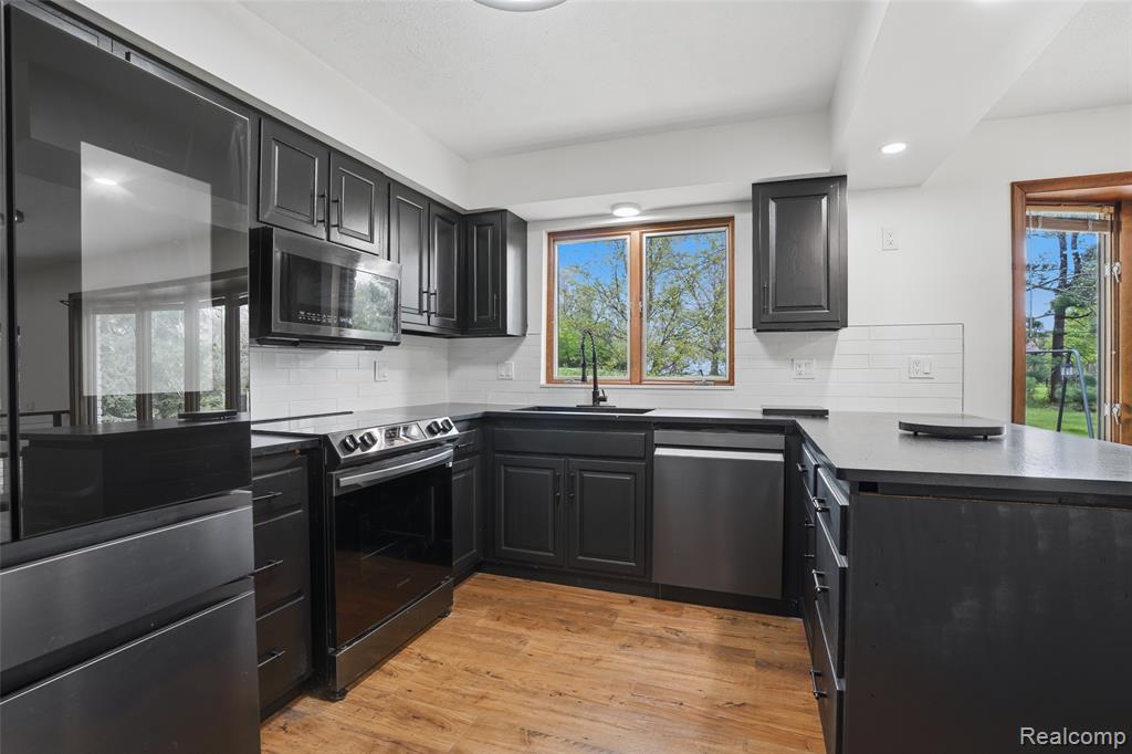 11221 Meadowood Drive, Brighton, MI 48114 — Photo 18