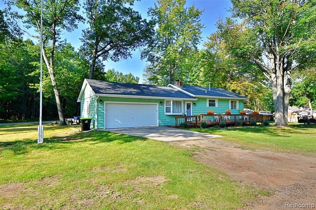 8702 Center Street, St. Helen, MI 48656 — front exterior