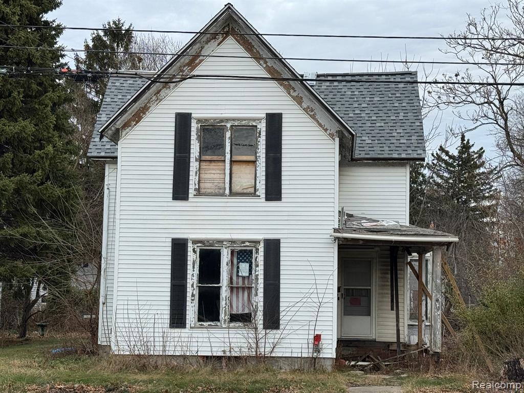 602 N SHIAWASSEE Street, Owosso, MI 48867 — front exterior