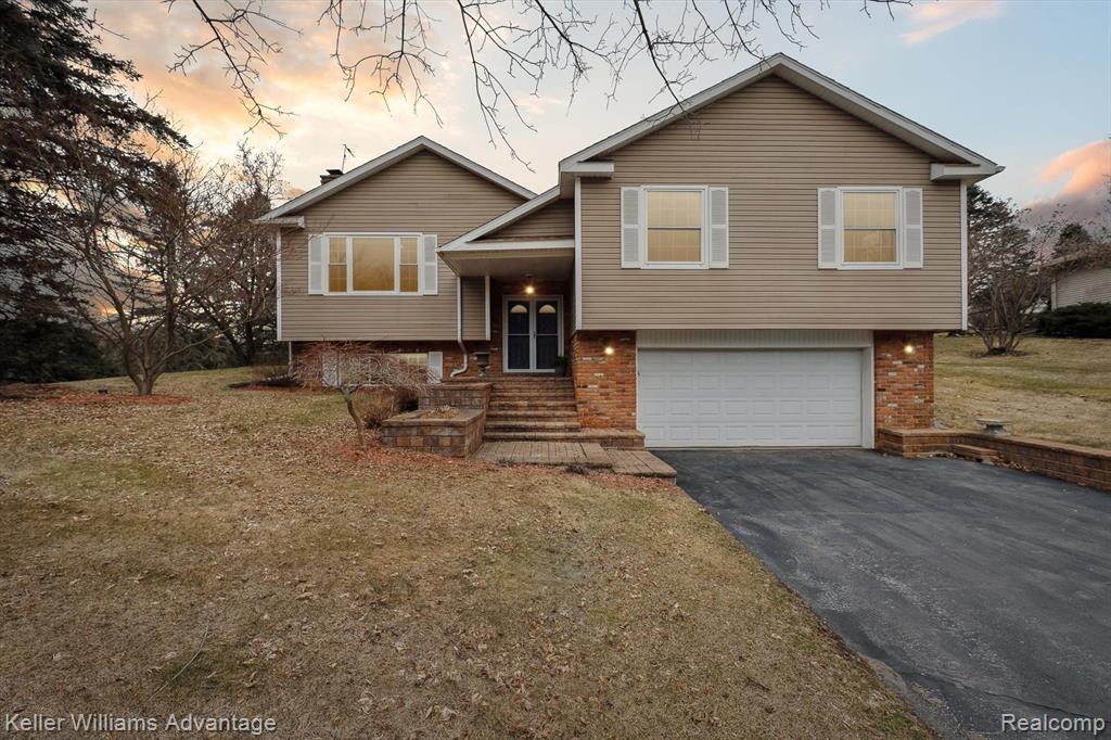 6521 Grand Circle Drive, Brighton, MI 48116 — front exterior