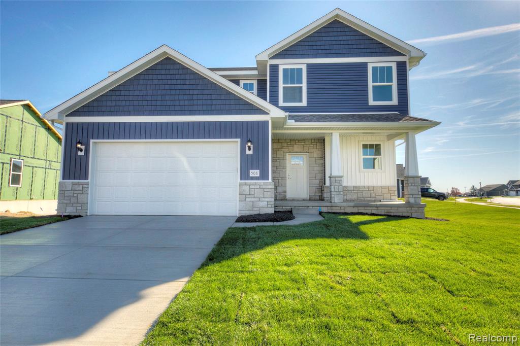 MOH 123 GAMBREL LN, Howell, MI 48843 — front exterior