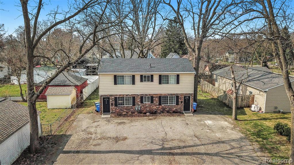 415 RAILROAD Street, Howell, MI 48843 — front exterior