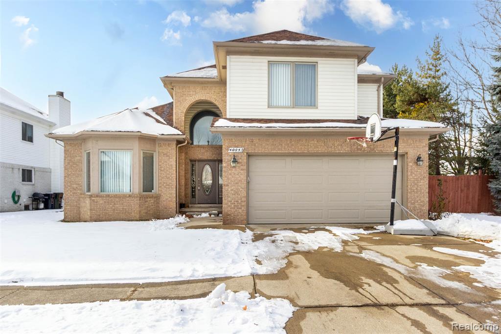 40945 Justin Drive, Sterling Heights, MI 48310 — front exterior