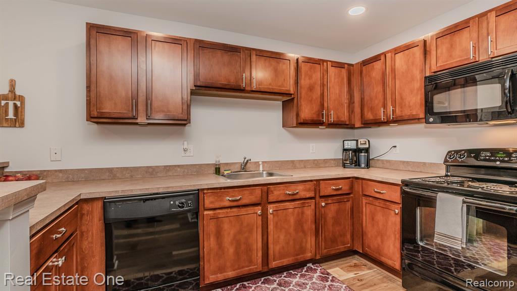 28209 Oakmonte Circle E, 60, New Hudson, MI 48165 — Photo 13