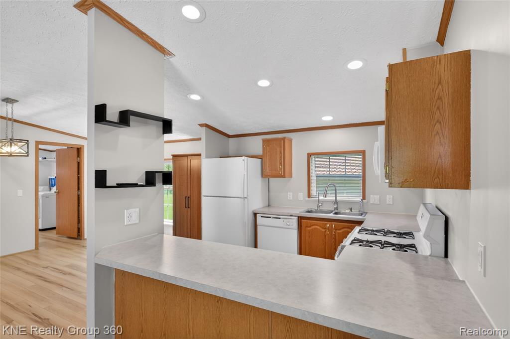 672 Red Oaks Drive, Howell, MI 48843 — Photo 11