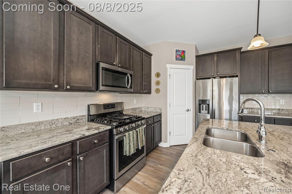 9265 Regency Boulevard, Pinckney, MI 48169 — Photo 18