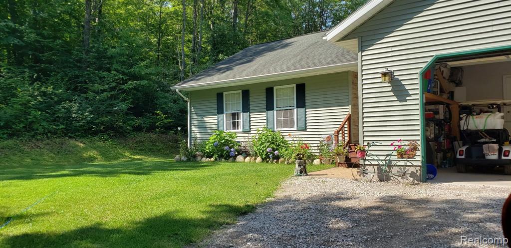 9447 MENOMINEE Trail, Gaylord, MI 49735 — Photo 35