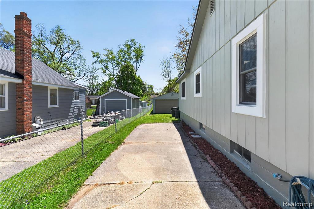 677 Lucille Drive, Wolverine Lake, MI 48390 — Photo 36