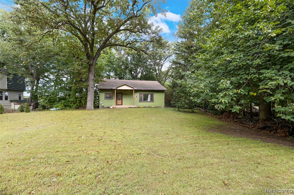 8720 River Valley Road, Brighton, MI 48116 — front exterior