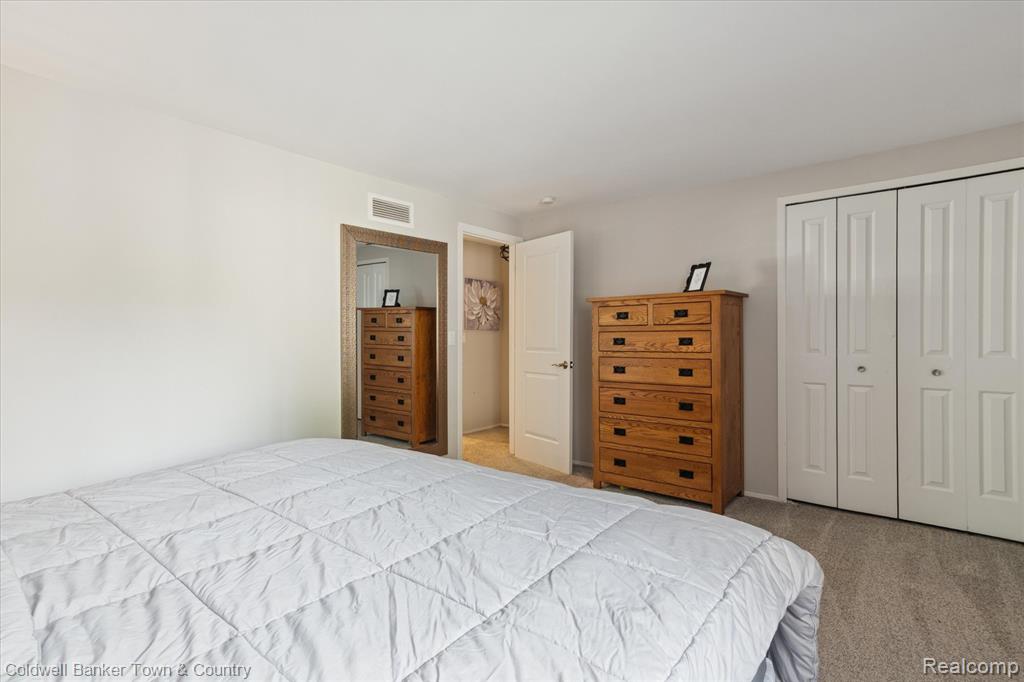 616 Rickett Road, 124, Brighton, MI 48116 — Photo 16