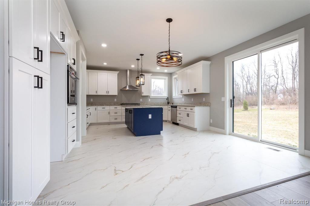 2910 LOON Drive, Wixom, MI 48393 — Photo 57