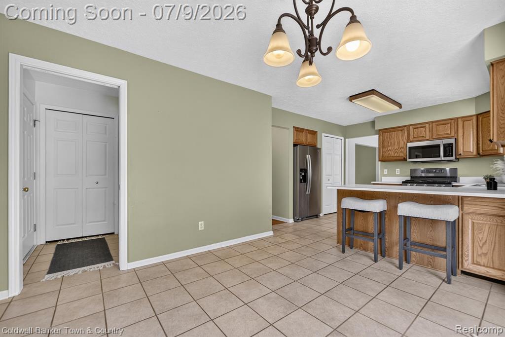 9016 Hyacinth Way, Brighton, MI 48116 — Photo 16