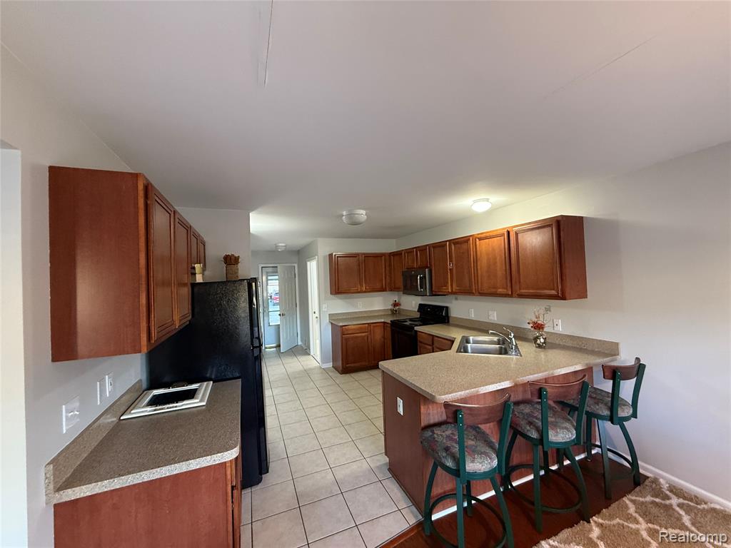 6063 Pine Cone Drive, Grand Blanc, MI 48439 — Photo 11