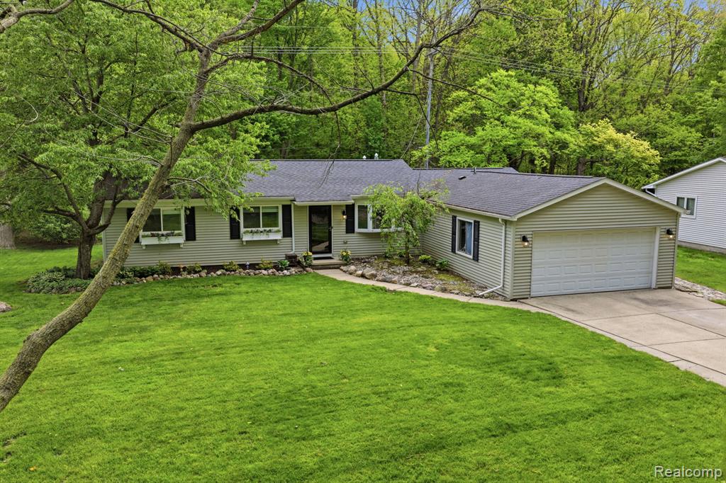 58032 Robroy Street, Washington, MI — front exterior