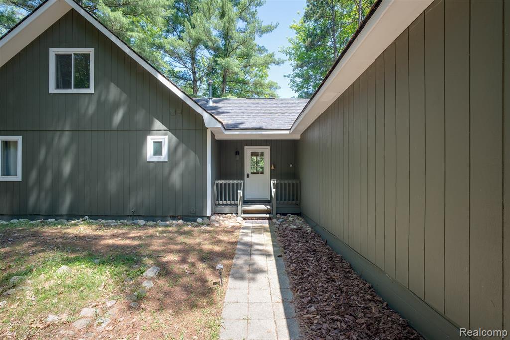 6954 AARWOOD Trail NW, Rapid City, MI 49676 — Photo 2