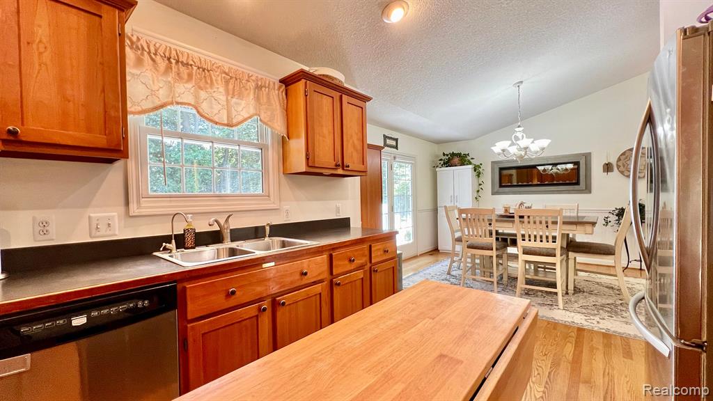8324 WOODLAND Circle, Goodrich Vlg, MI — Photo 13