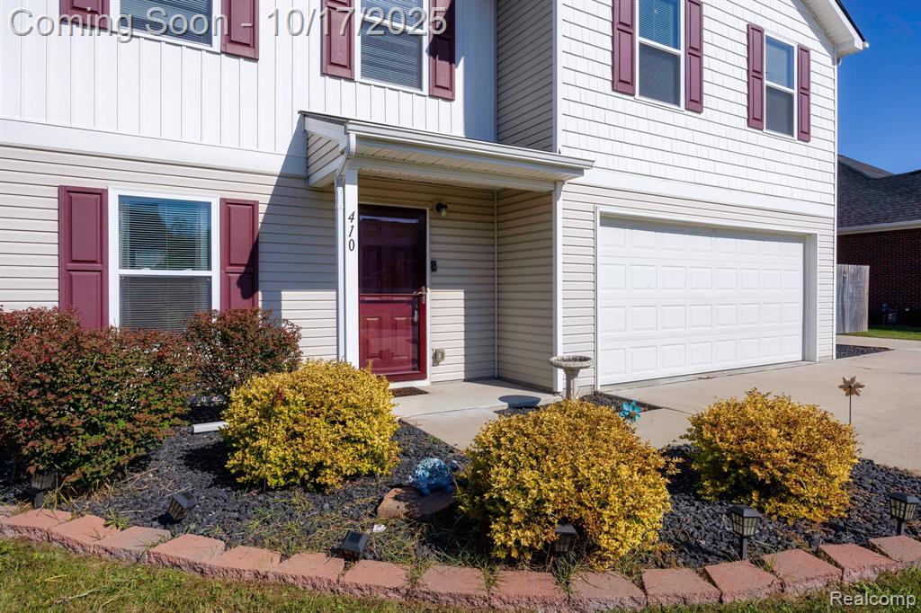 410 Natures Way, Carleton, MI 48117 — front exterior
