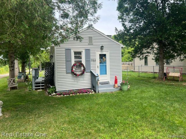 7153 CEDAR Road, Lexington, MI 48450 — front exterior