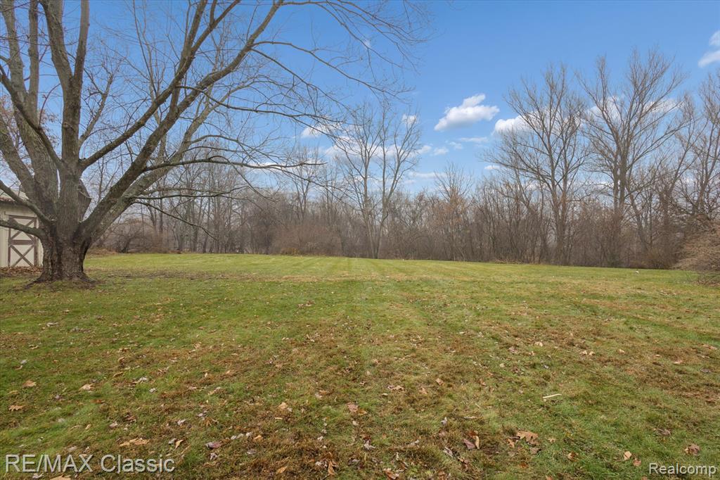 5594 Harper Road, Holt, MI 48842 — Photo 41