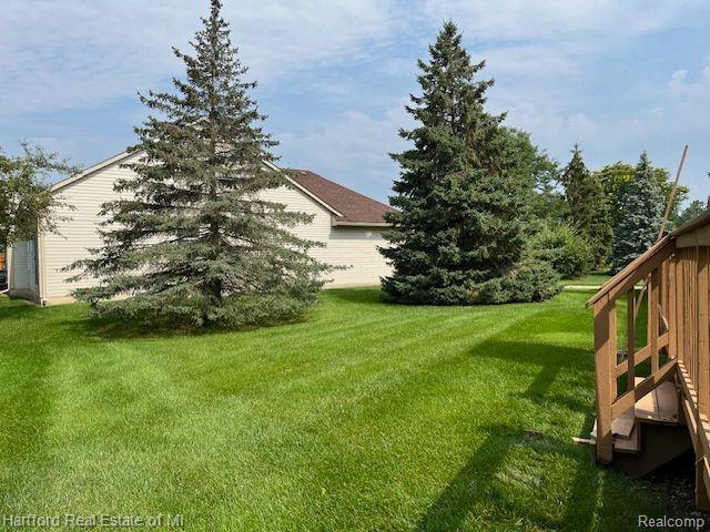 395 WOODVALE Drive, Walled Lake, MI 48390 — Photo 38
