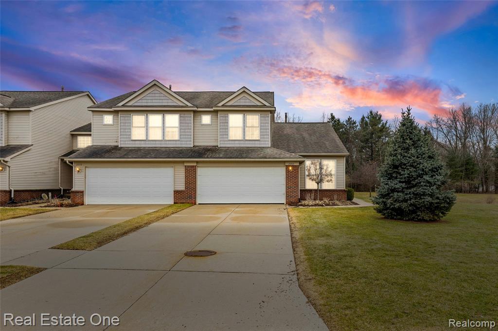 2283 Crystal Crossing Drive, Howell, MI 48843 — front exterior