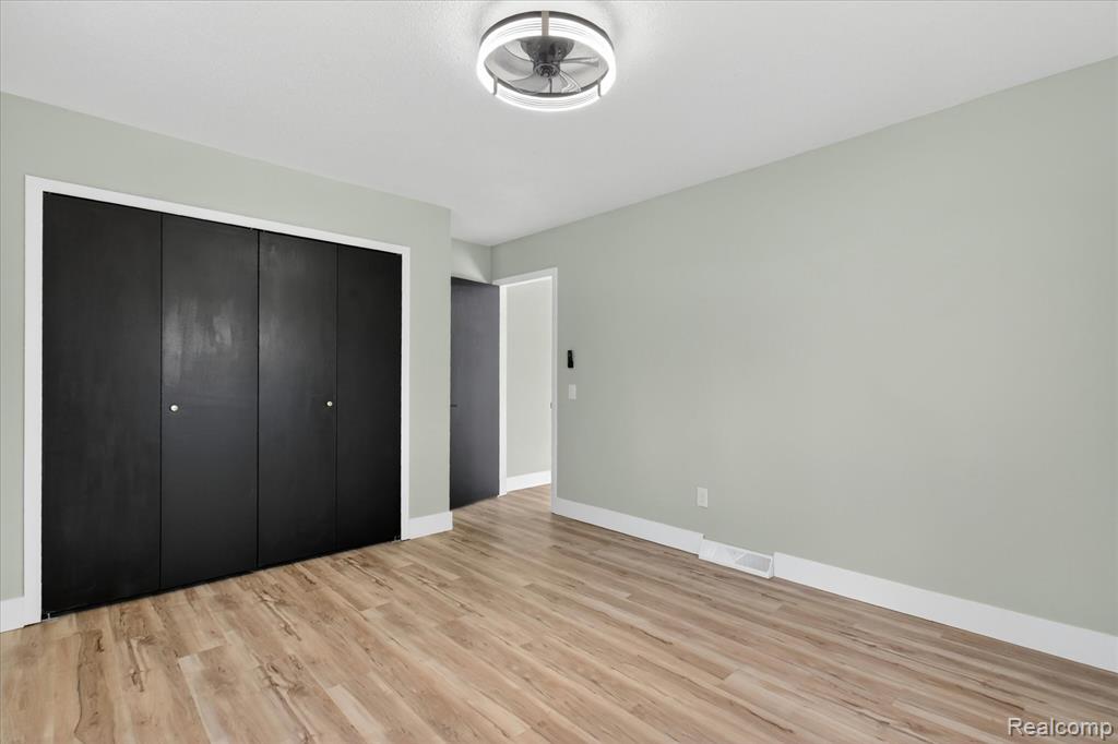 677 Lucille Drive, Wolverine Lake, MI 48390 — Photo 21