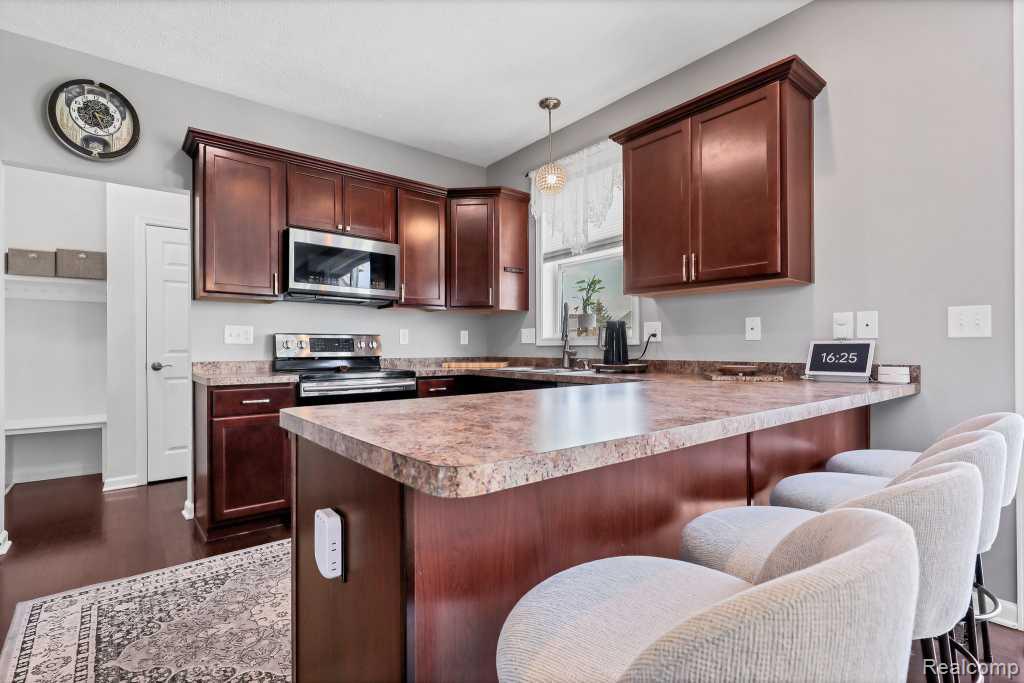 6873 Abbey Lane, Grand Ledge, MI 48837 — Photo 9