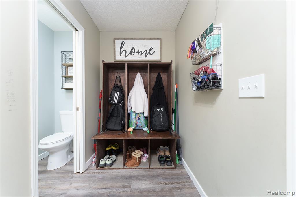 7047 Bennington Greens Drive, Owosso, MI 48867 — Photo 24