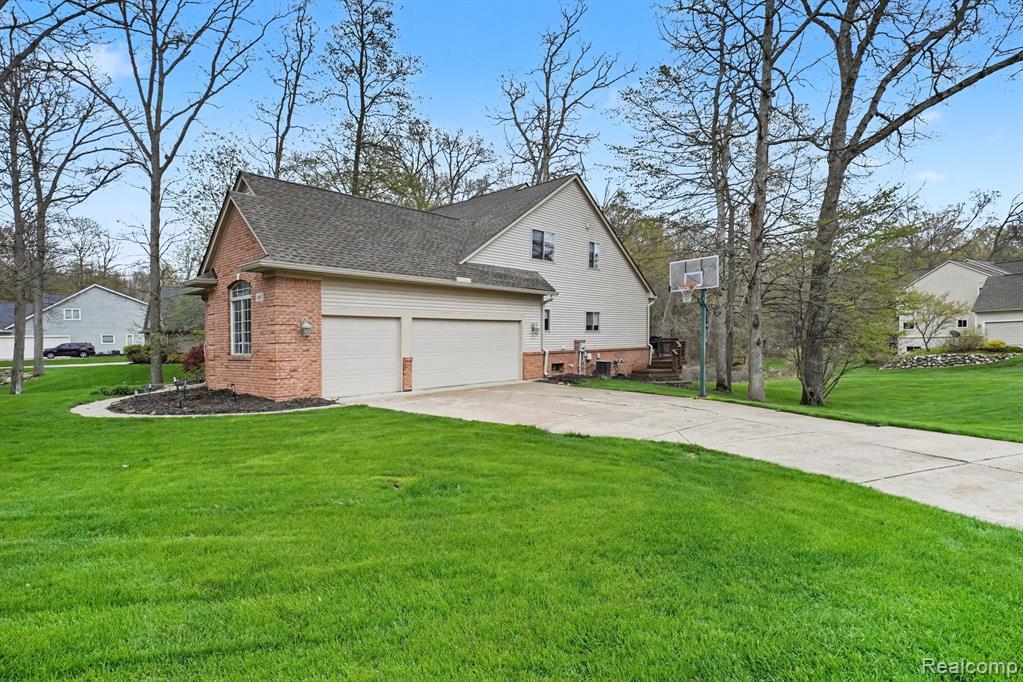 1865 Elkridge Circle, Highland, MI 48356 — Photo 27