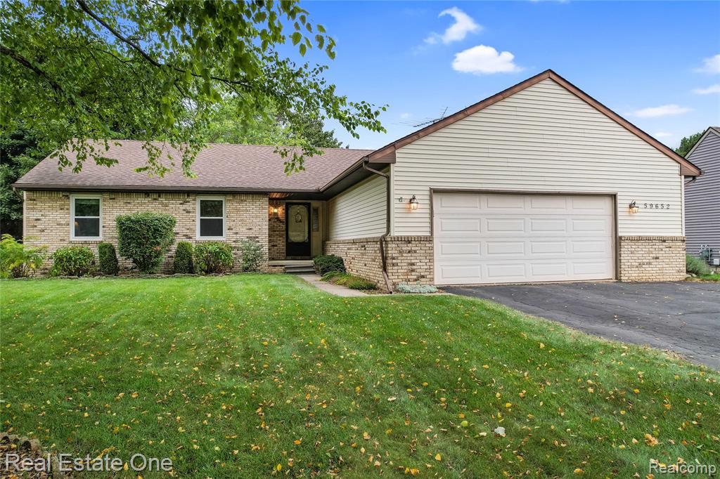 59652 Sunridge Drive, New Hudson, MI 48165 — front exterior
