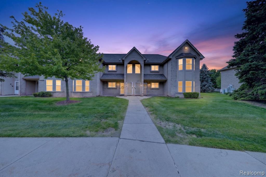 44393 Sunnyside Drive, 38, Sterling Heights, MI 48313 — front exterior