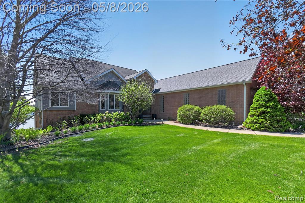 8955 Sandy Ridge Drive, White Lake, MI — front exterior