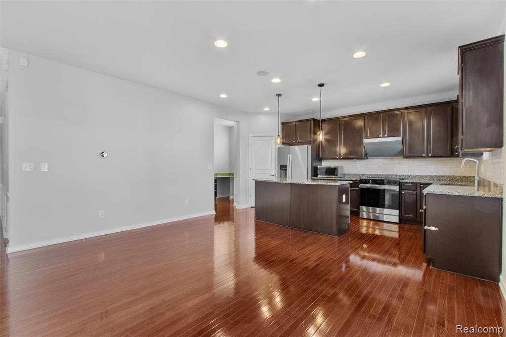 57570 Village Drive, New Hudson, MI 48165 — Photo 15