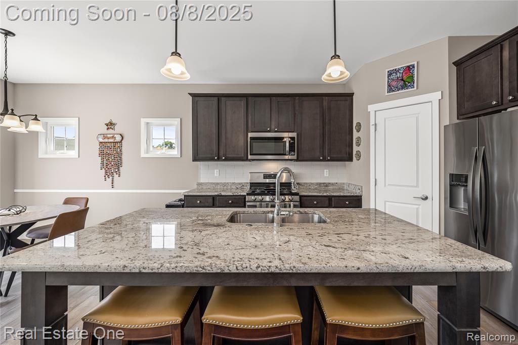 9265 Regency Boulevard, Pinckney, MI 48169 — Photo 16