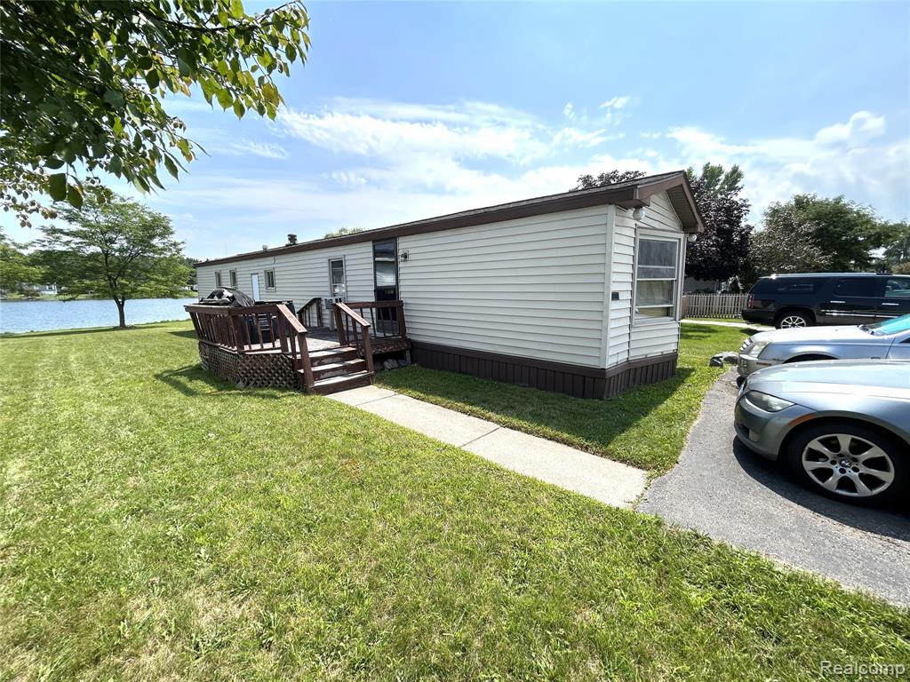 48582 Lakeview Circle, Shelby Twp, MI 48317 — front exterior