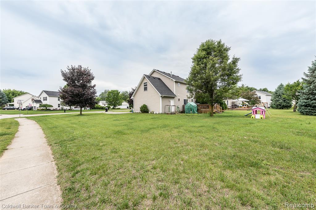 650 Christopher Street, Fowlerville, MI 48836 — Photo 31