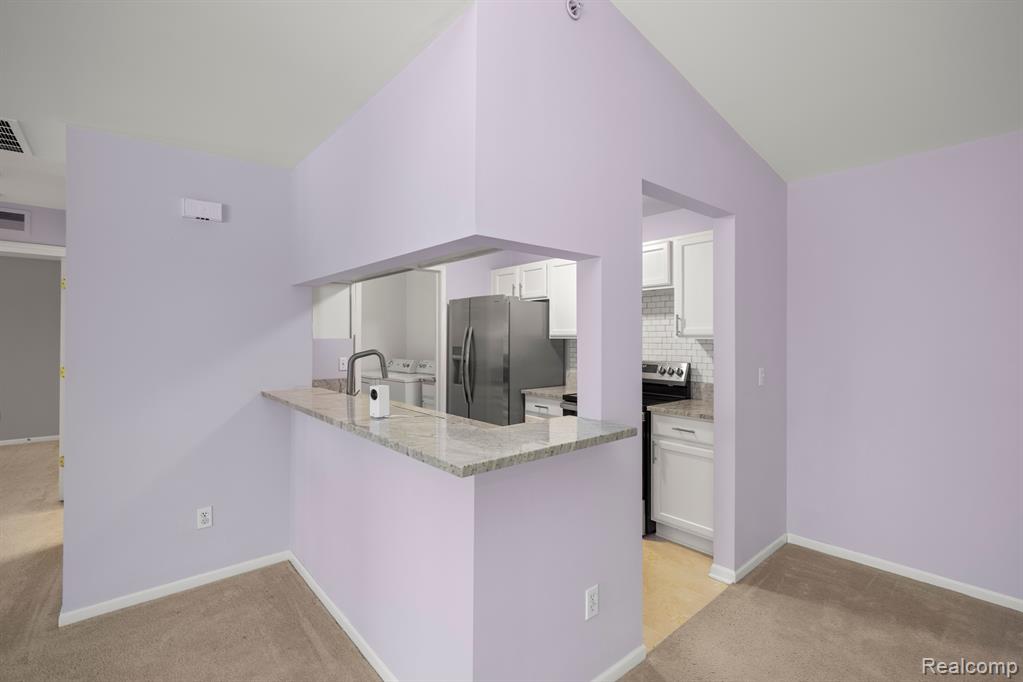 28260 OAKMONTE Circle E, New Hudson, MI 48165 — Photo 16